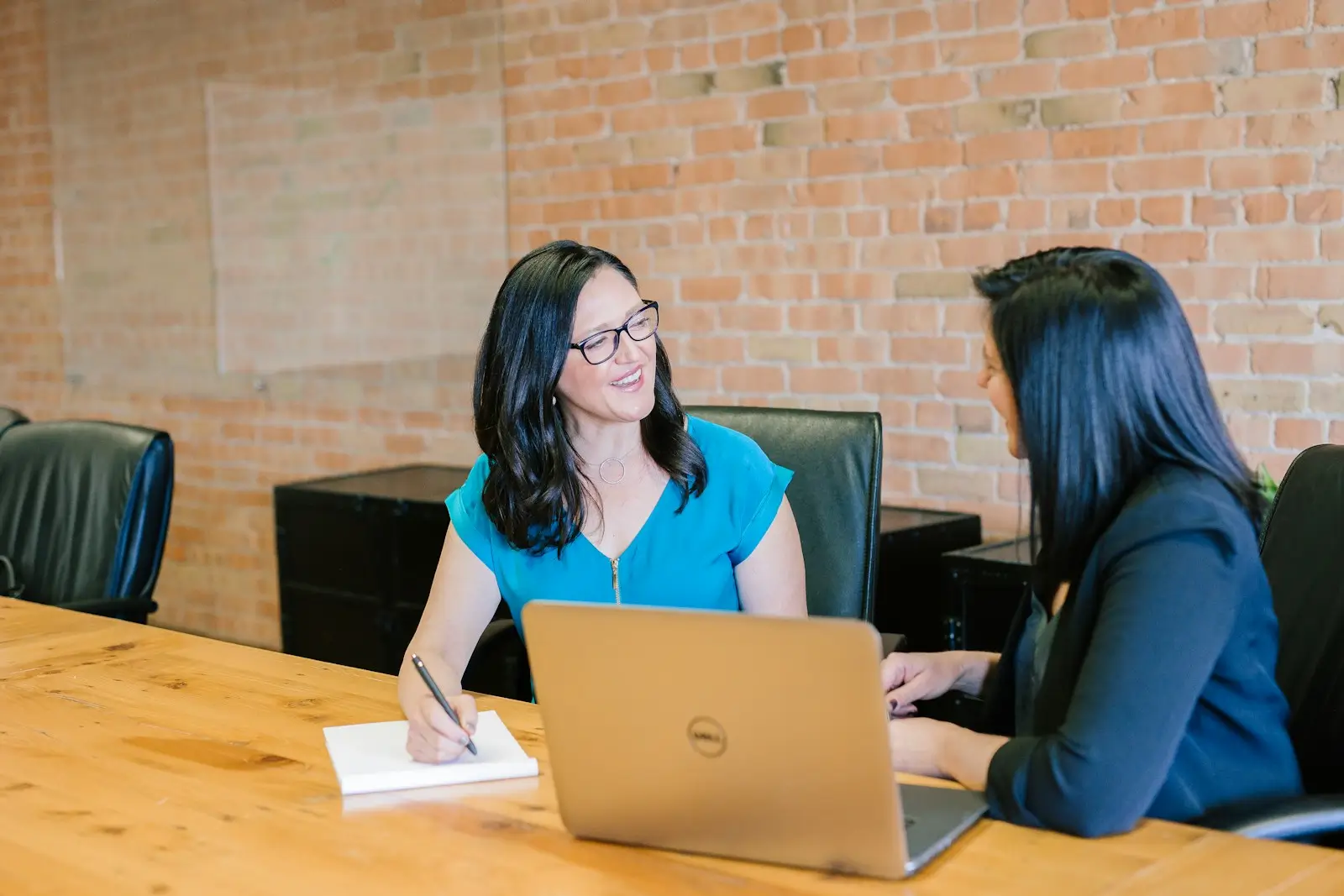 Financial advisor explaining commercial metrics and financial health indicators to a business director